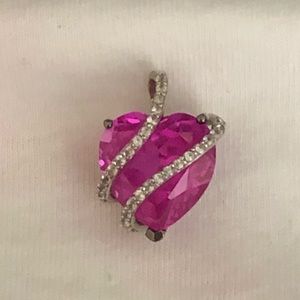 Pink sapphire and diamond pendant